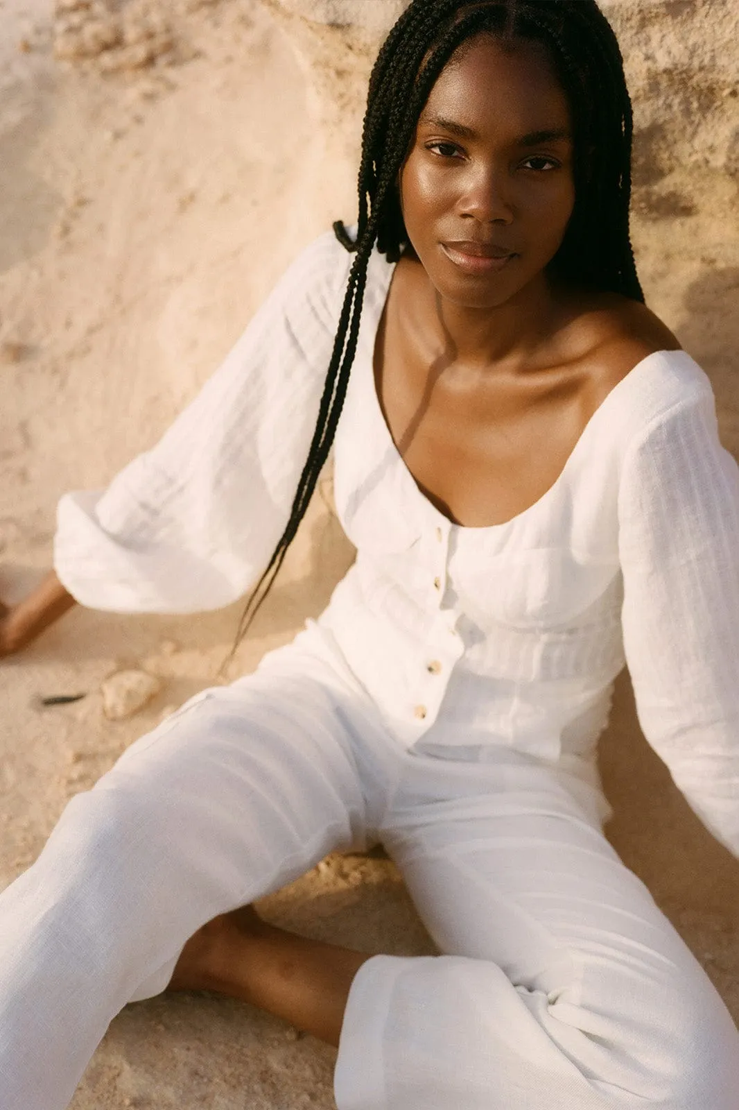 The Carmen Long-Sleeved Bustier Top in off-white