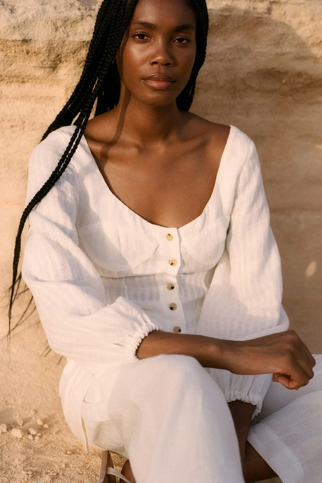 The Carmen Long-Sleeved Bustier Top in off-white